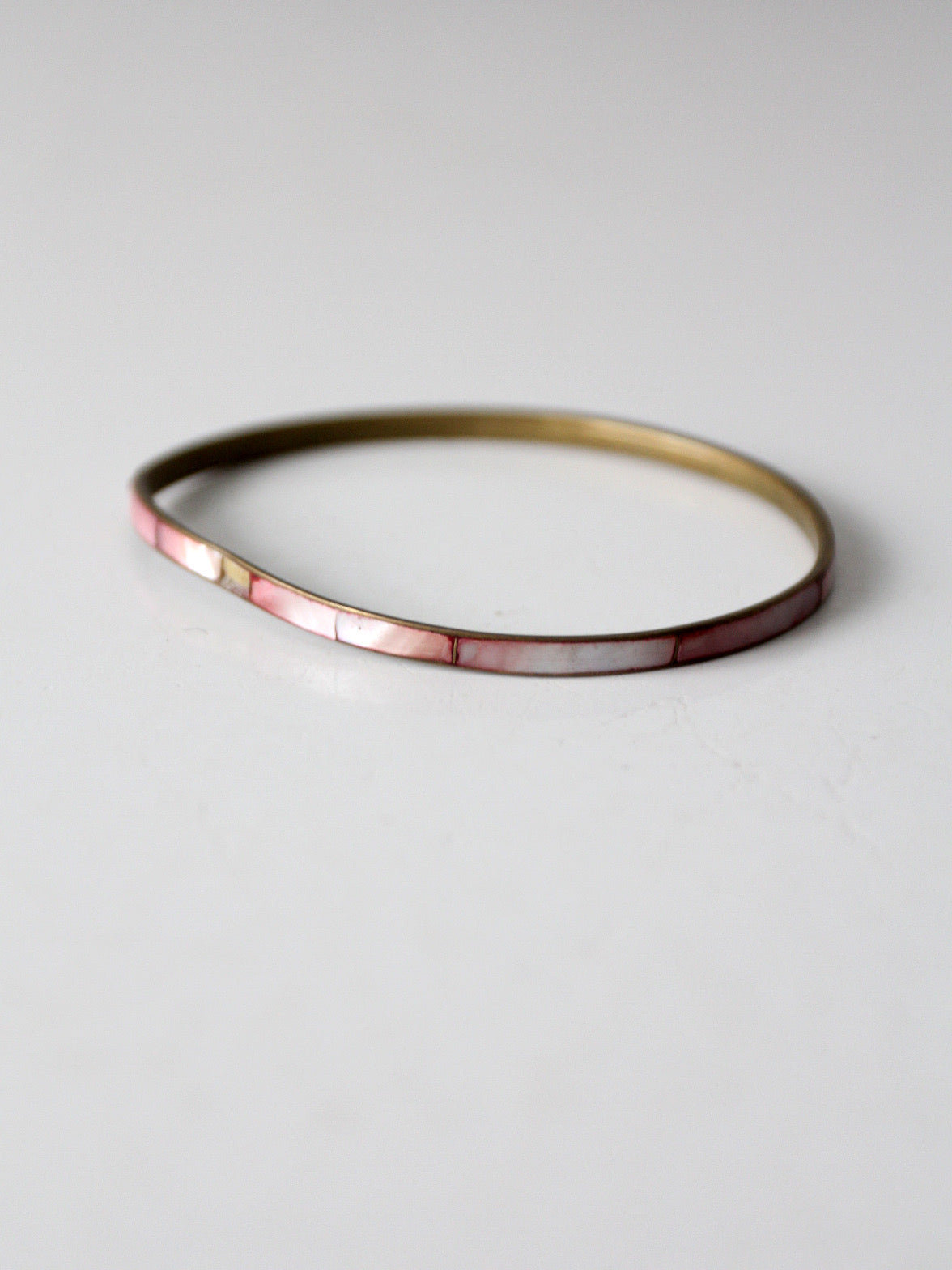 1970s pink shell inlay brass bangle bracelet