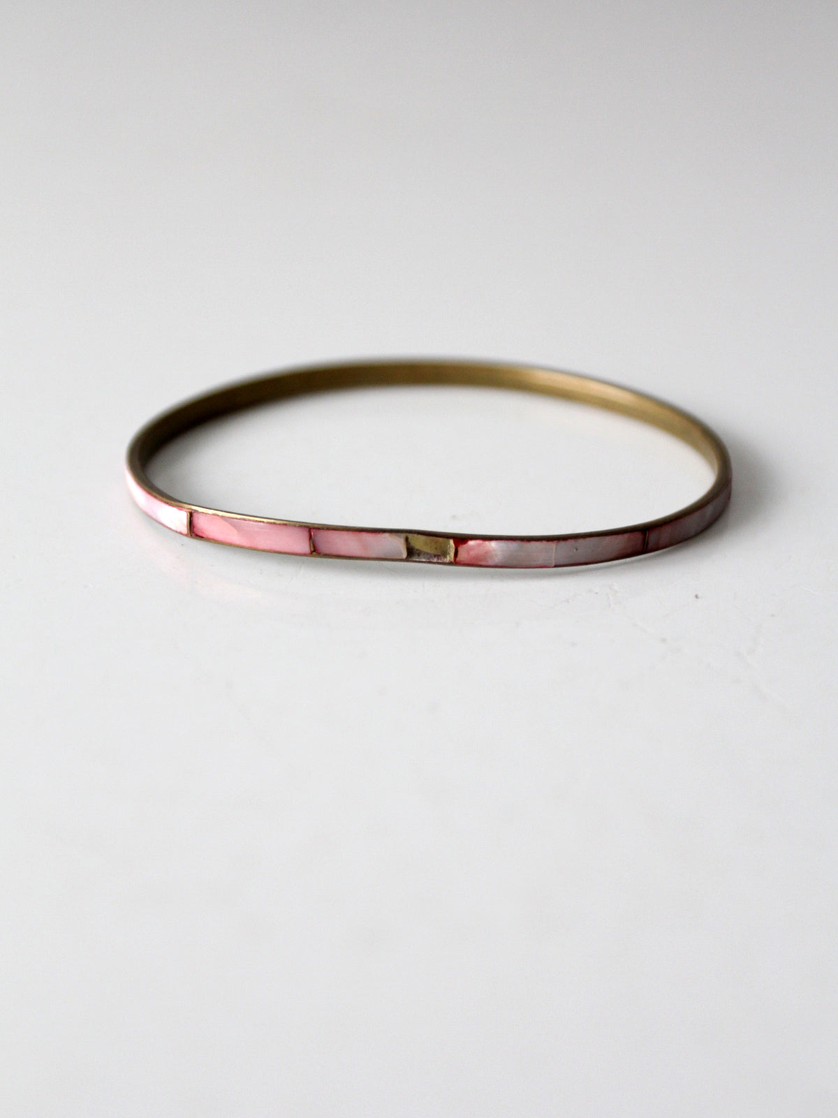 1970s pink shell inlay brass bangle bracelet