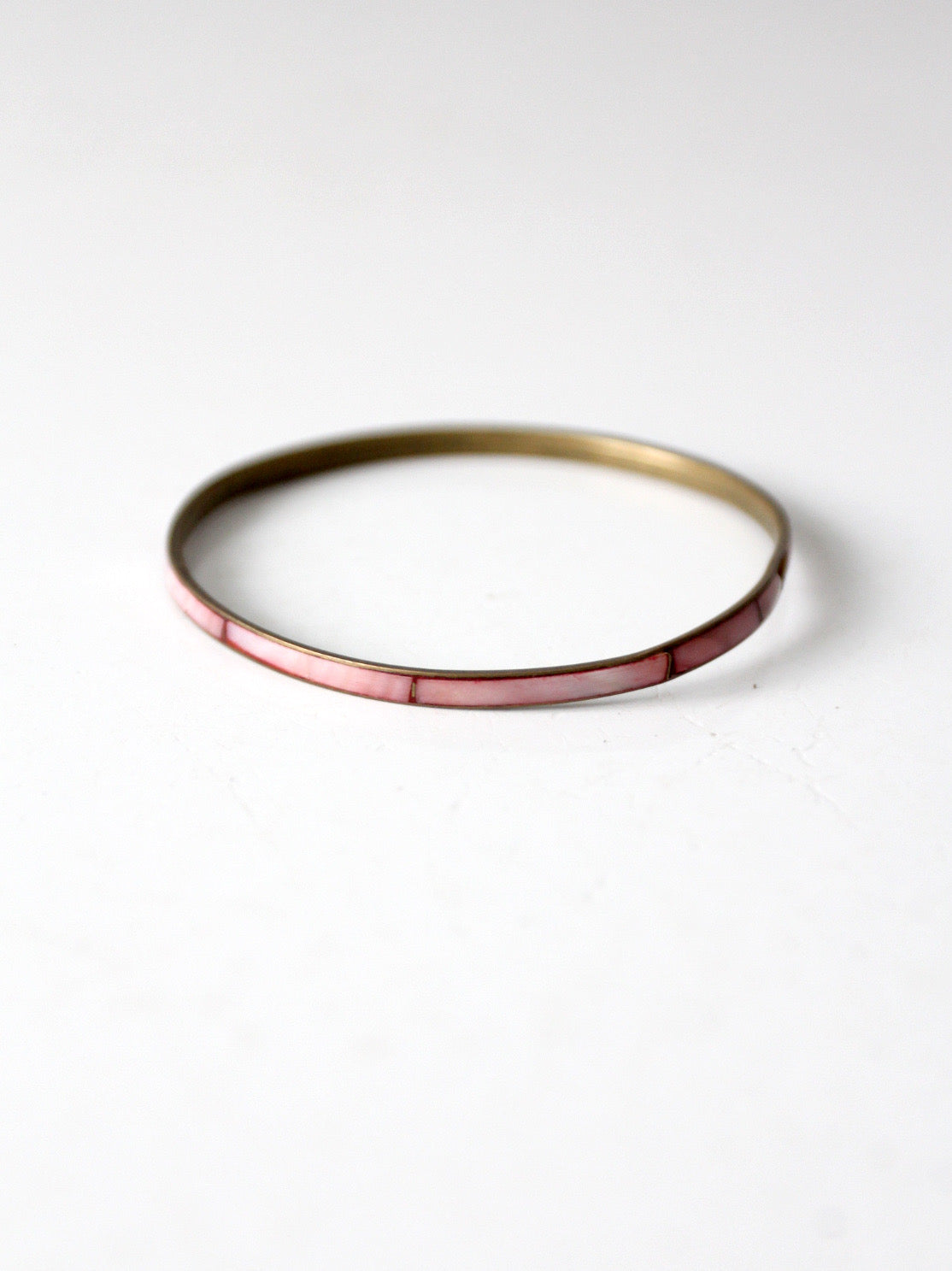 1970s pink shell inlay brass bangle bracelet