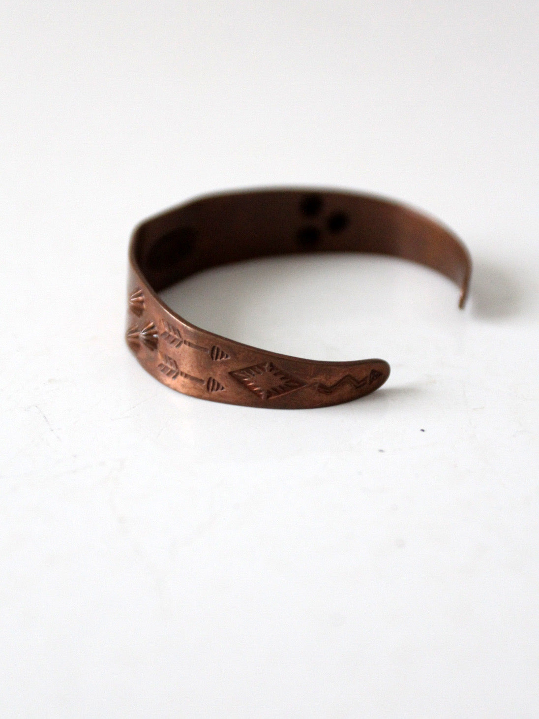 vintage stamped copper Southwestern cuff