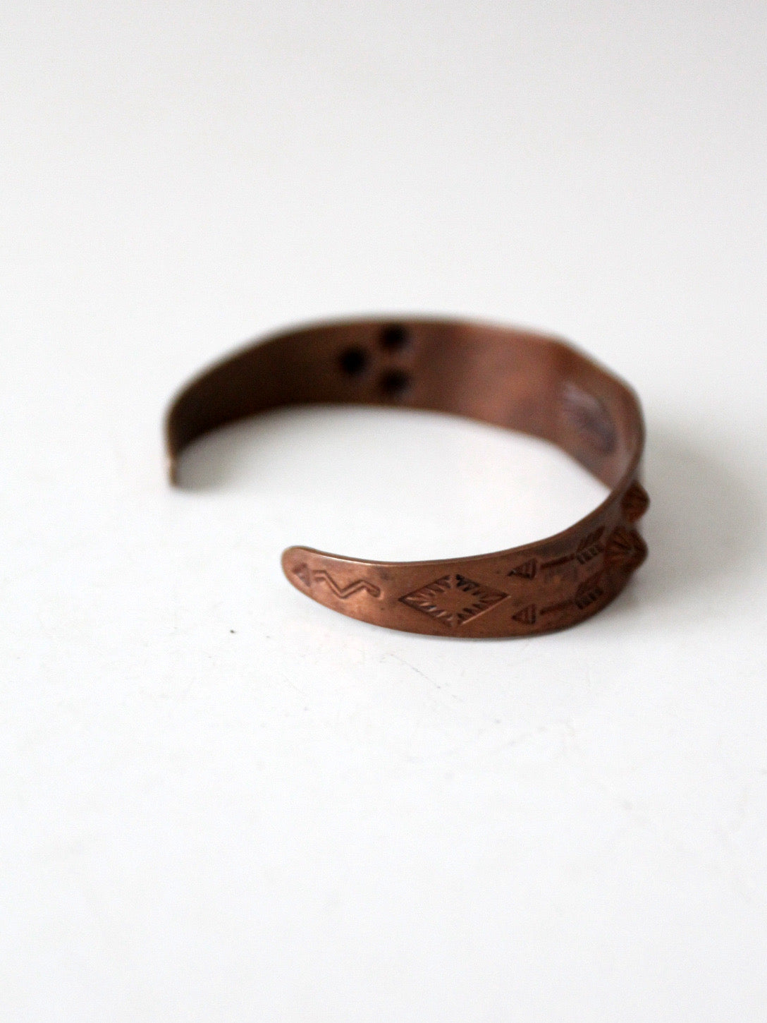 vintage stamped copper Southwestern cuff
