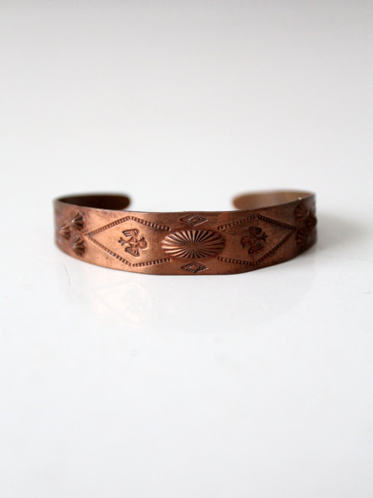 vintage stamped copper Southwestern cuff