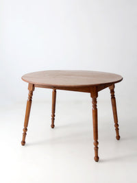 mid-century Dearborn Co drop leaf dining table with extensions