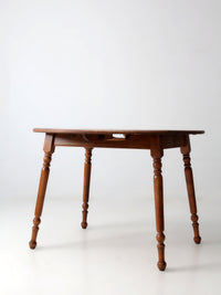mid-century Dearborn Co drop leaf dining table with extensions