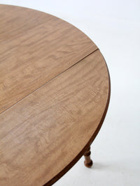 mid-century Dearborn Co drop leaf dining table with extensions