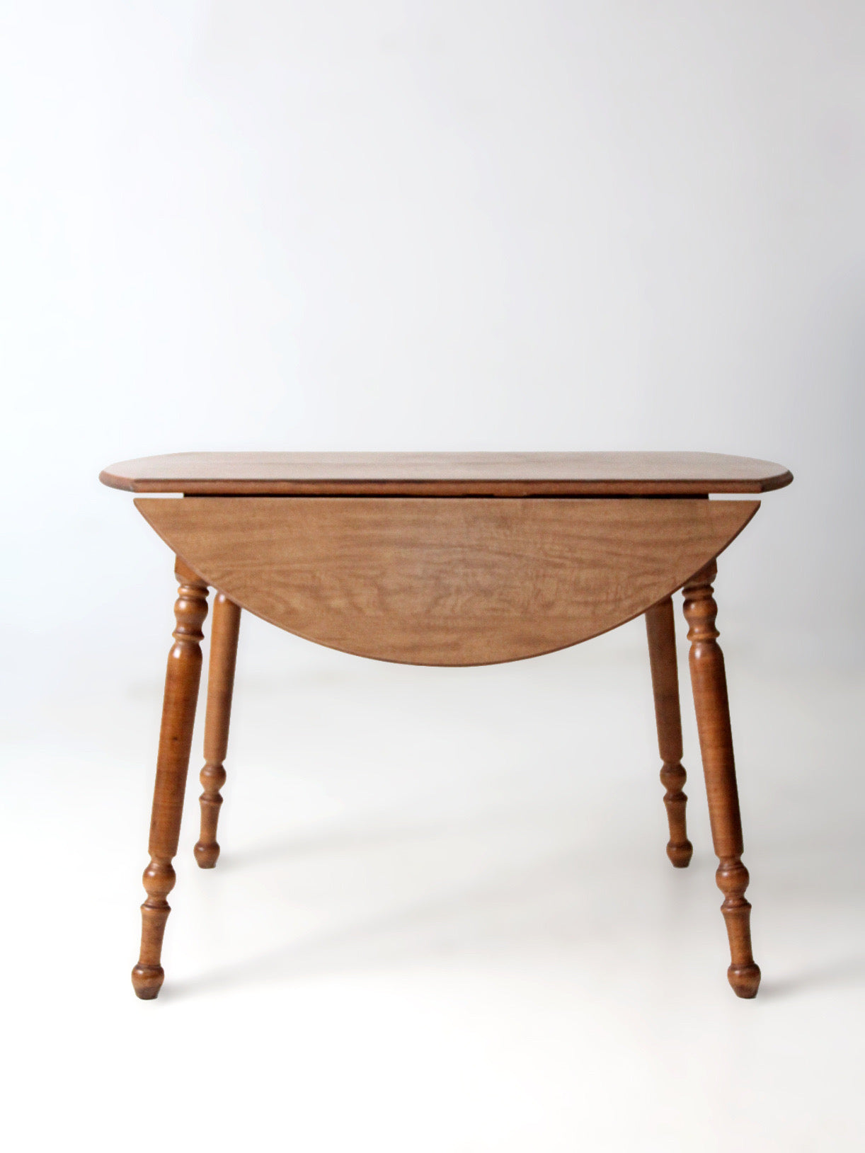 mid-century Dearborn Co drop leaf dining table with extensions