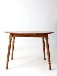 mid-century Dearborn Co drop leaf dining table with extensions