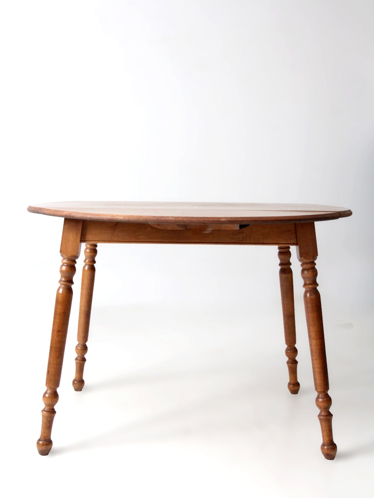 mid-century Dearborn Co drop leaf dining table with extensions