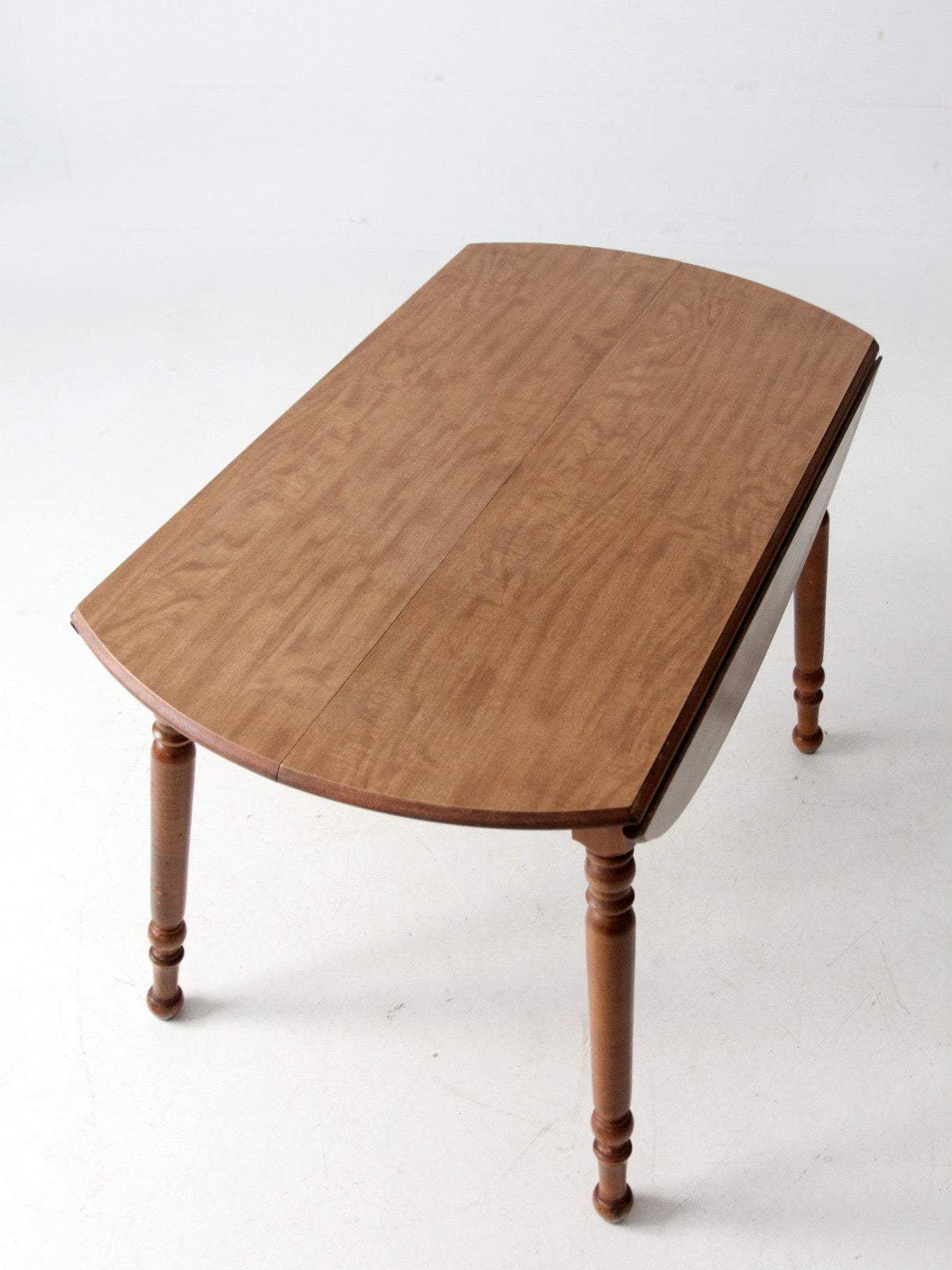 mid-century Dearborn Co drop leaf dining table with extensions