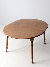 mid-century Dearborn Co drop leaf dining table with extensions