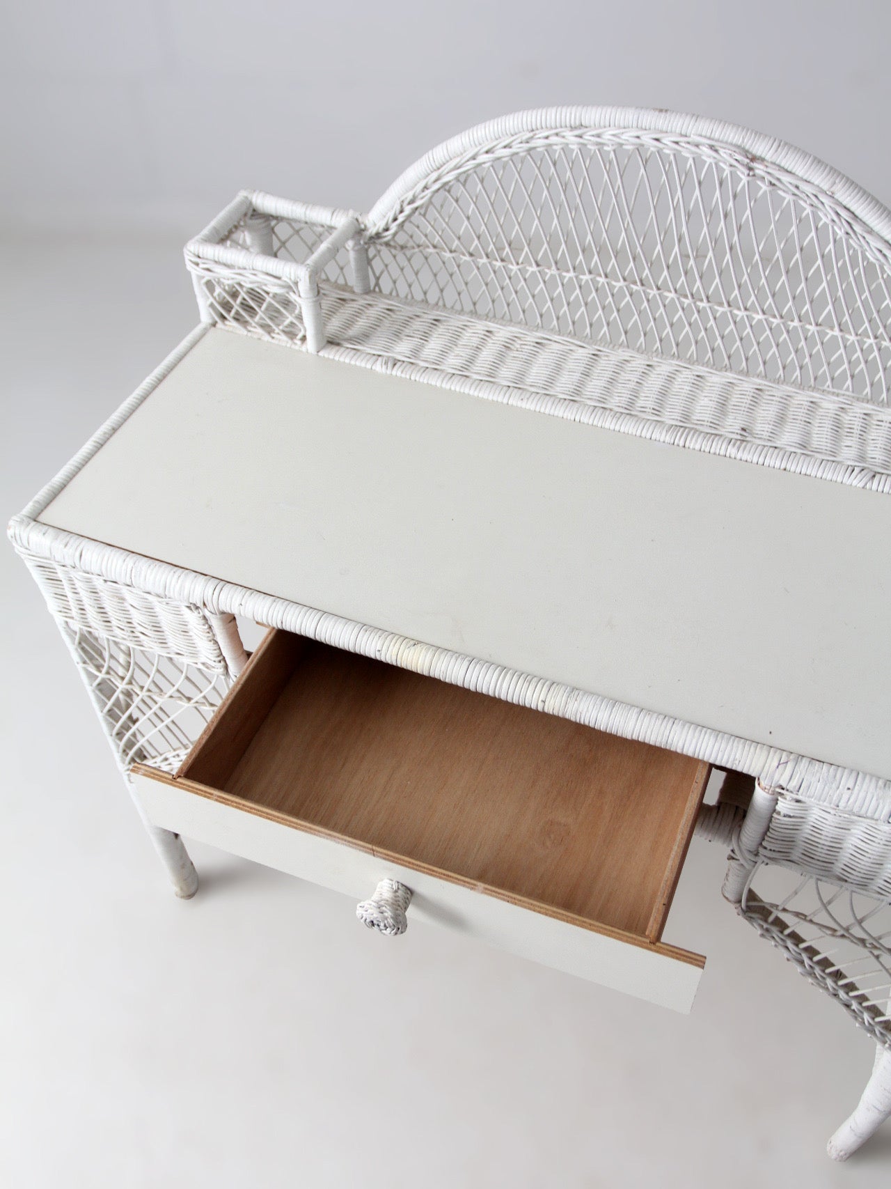 early 20th century American wicker desk with drawer