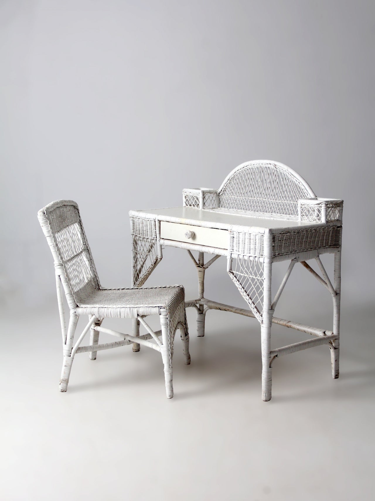 early 20th century American wicker desk with drawer