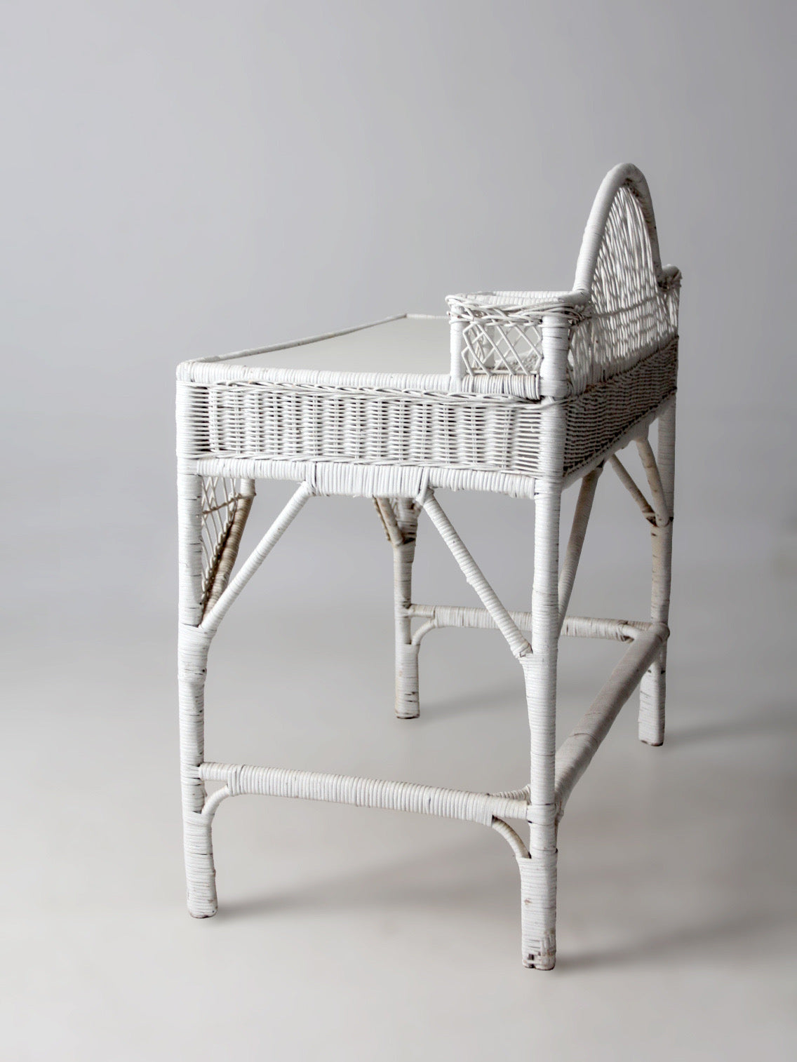 early 20th century American wicker desk with drawer