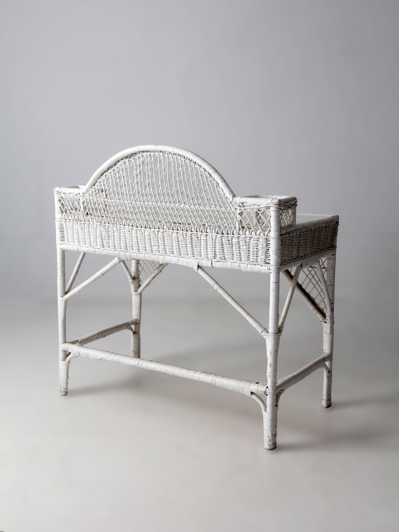 early 20th century American wicker desk with drawer