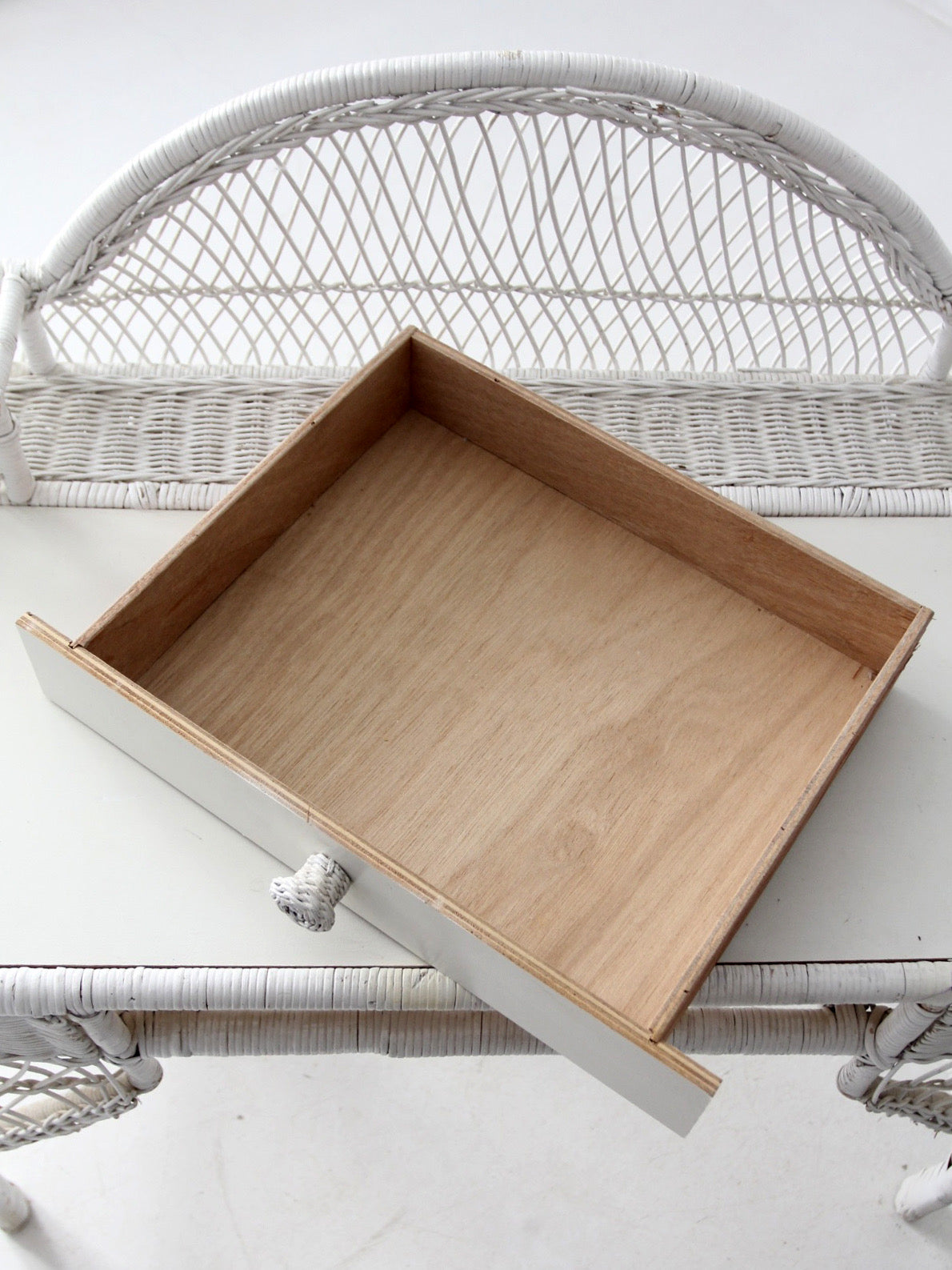 early 20th century American wicker desk with drawer