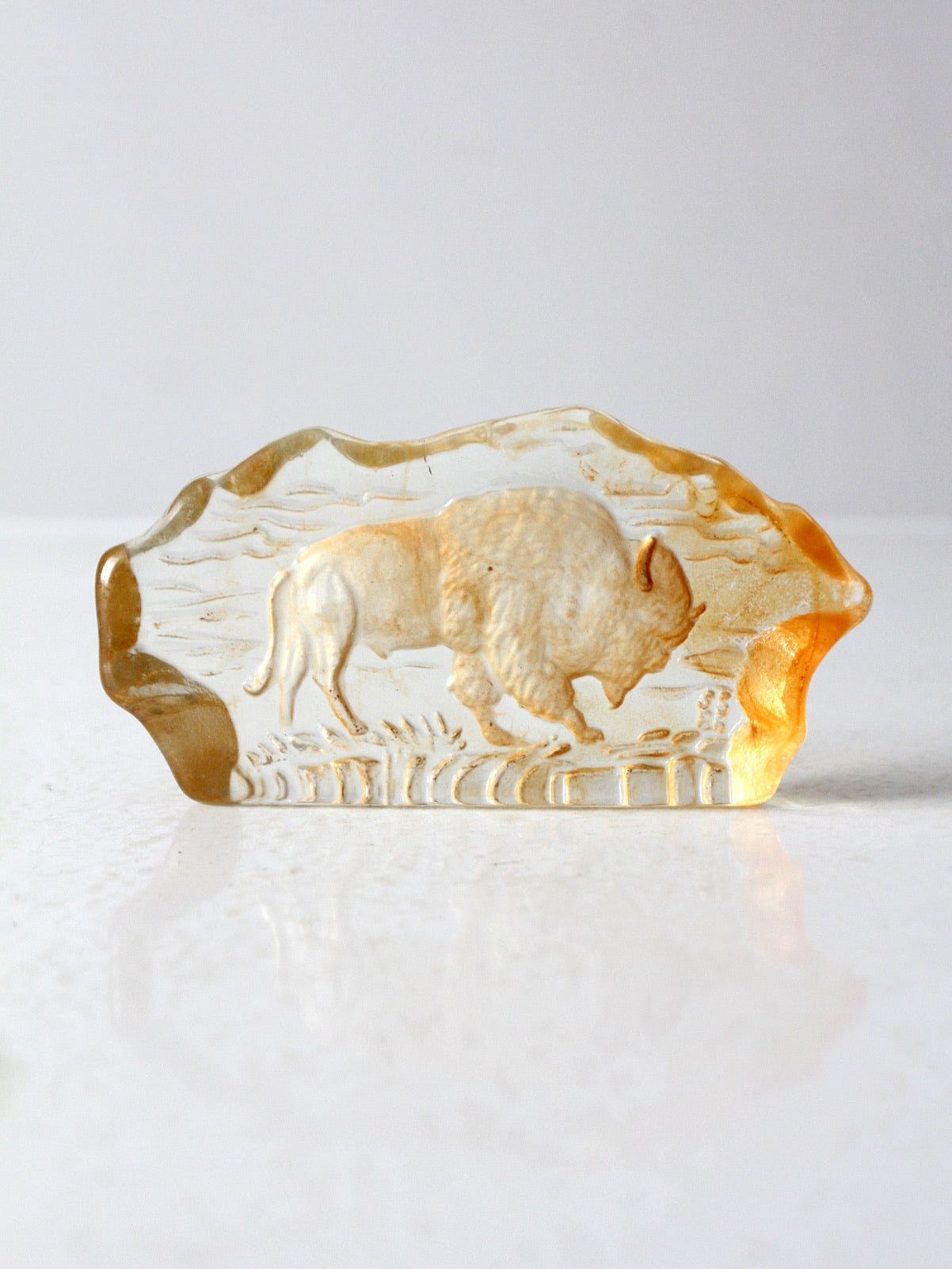 vintage resin paperweight with grazing bison