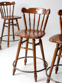 mid-century Tell City swivel counter stools