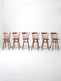 mid-century Tell City swivel counter stools
