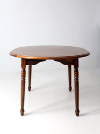 mid-century Colonial Revival extendable dining table