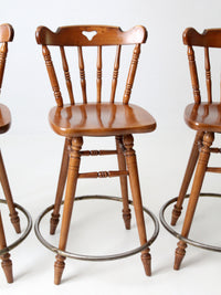 mid-century Tell City swivel counter stools