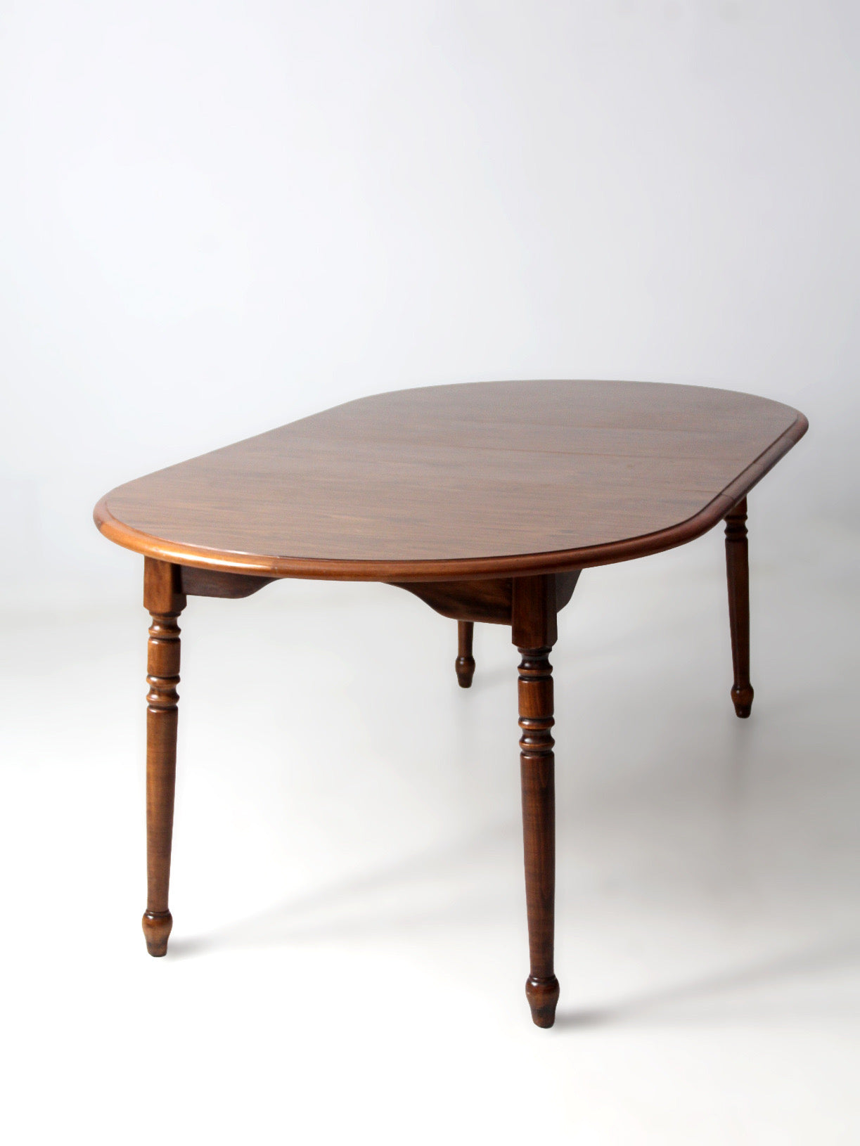 mid-century Colonial Revival extendable dining table