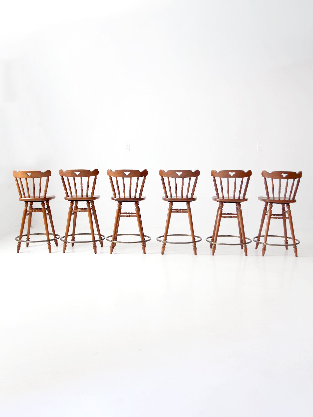 mid-century Tell City swivel counter stools