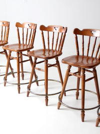 mid-century Tell City swivel counter stools