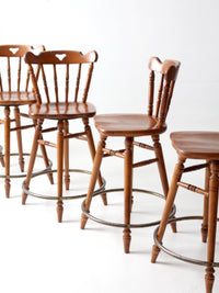 mid-century Tell City swivel counter stools