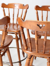 mid-century Tell City swivel counter stools