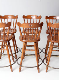 mid-century Tell City swivel counter stools