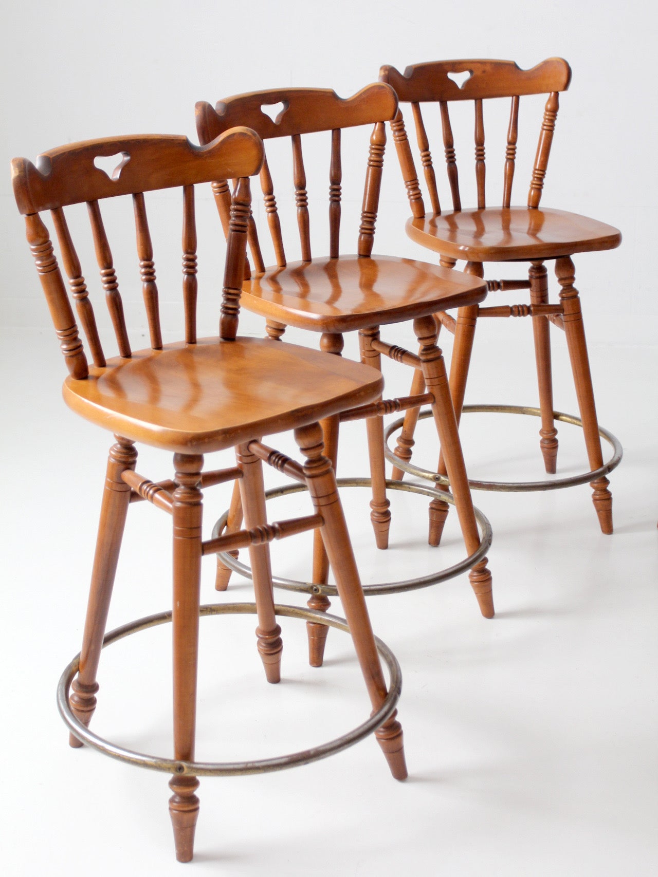 mid-century Tell City swivel counter stools
