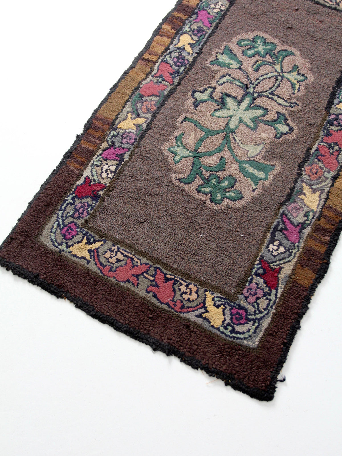 antique hand-hooked floral wool rug