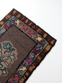 antique hand-hooked floral wool rug