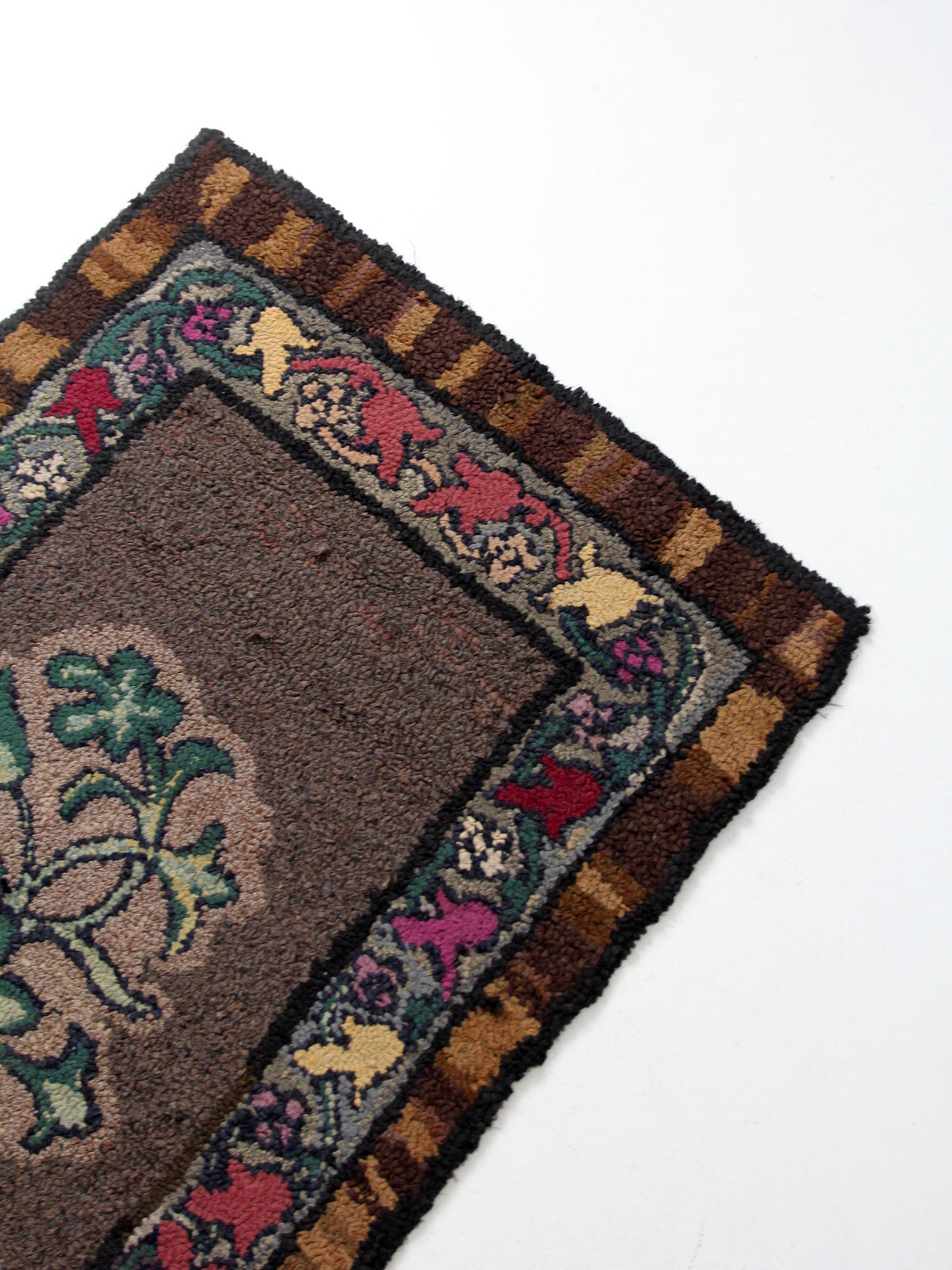 antique hand-hooked floral wool rug