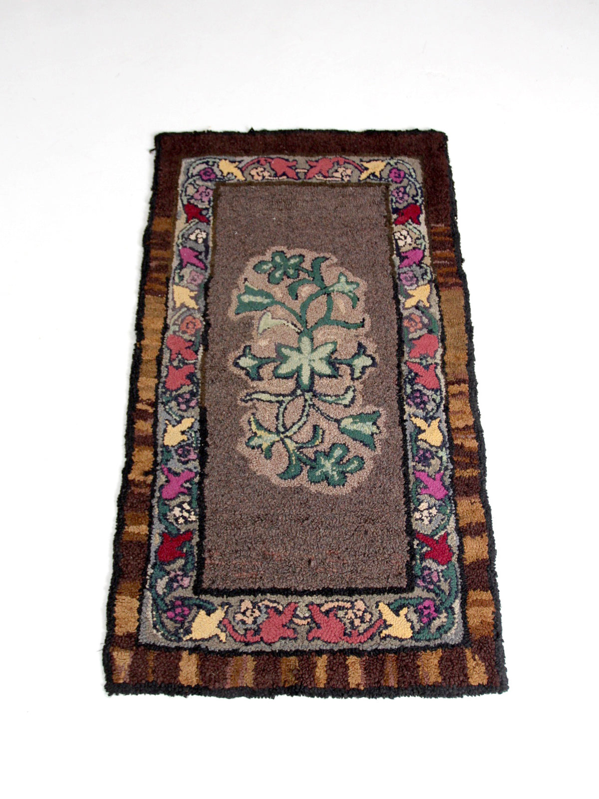 antique hand-hooked floral wool rug