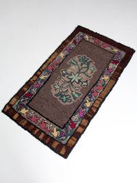 antique hand-hooked floral wool rug