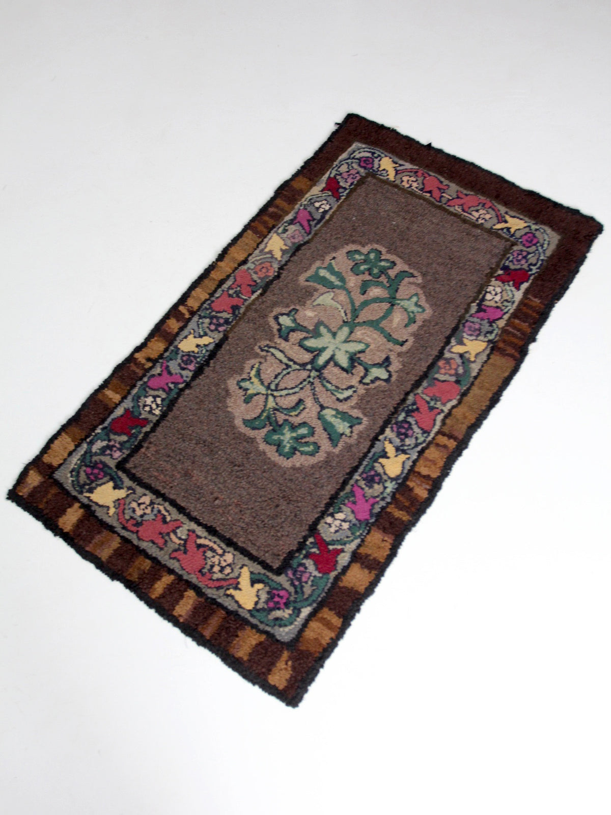 antique hand-hooked floral wool rug
