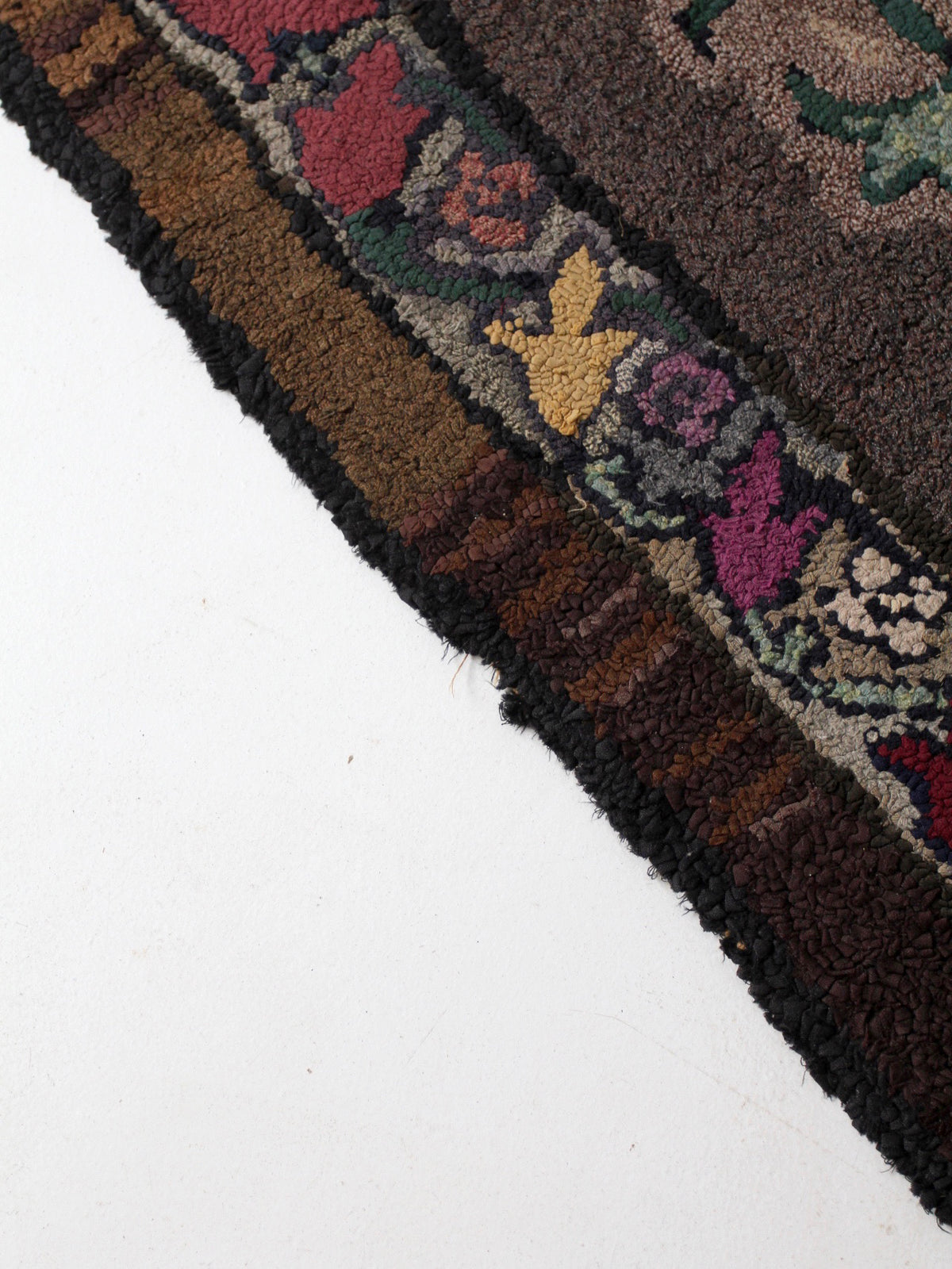 antique hand-hooked floral wool rug