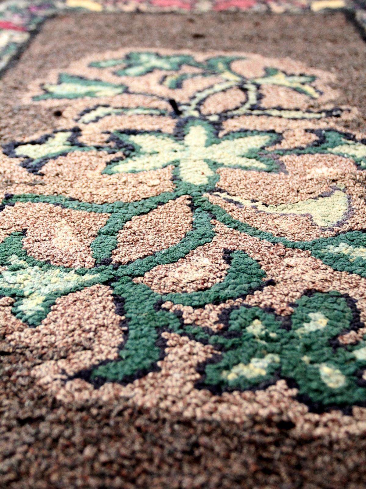 antique hand-hooked floral wool rug