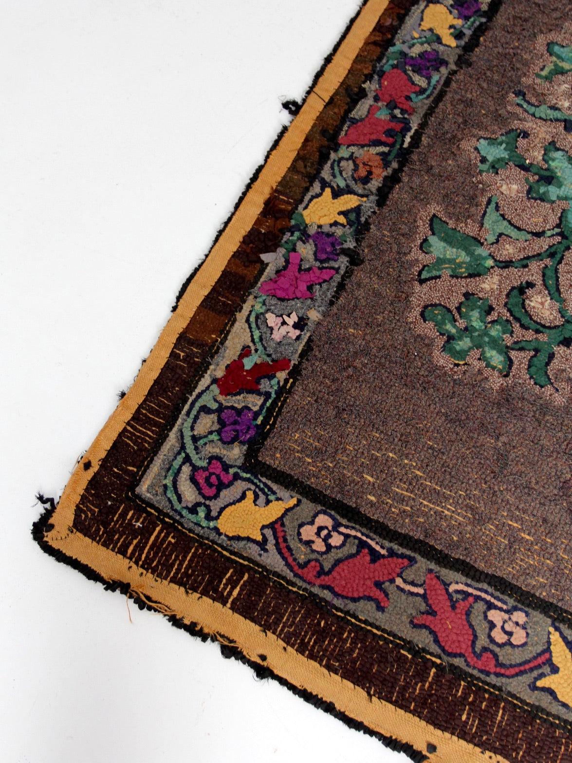 antique hand-hooked floral wool rug