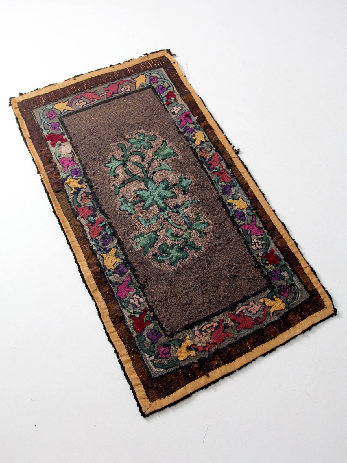 antique hand-hooked floral wool rug