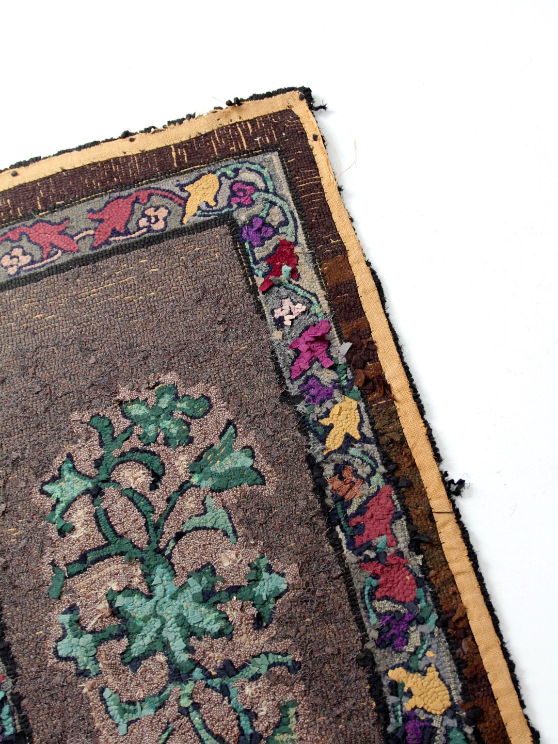 antique hand-hooked floral wool rug