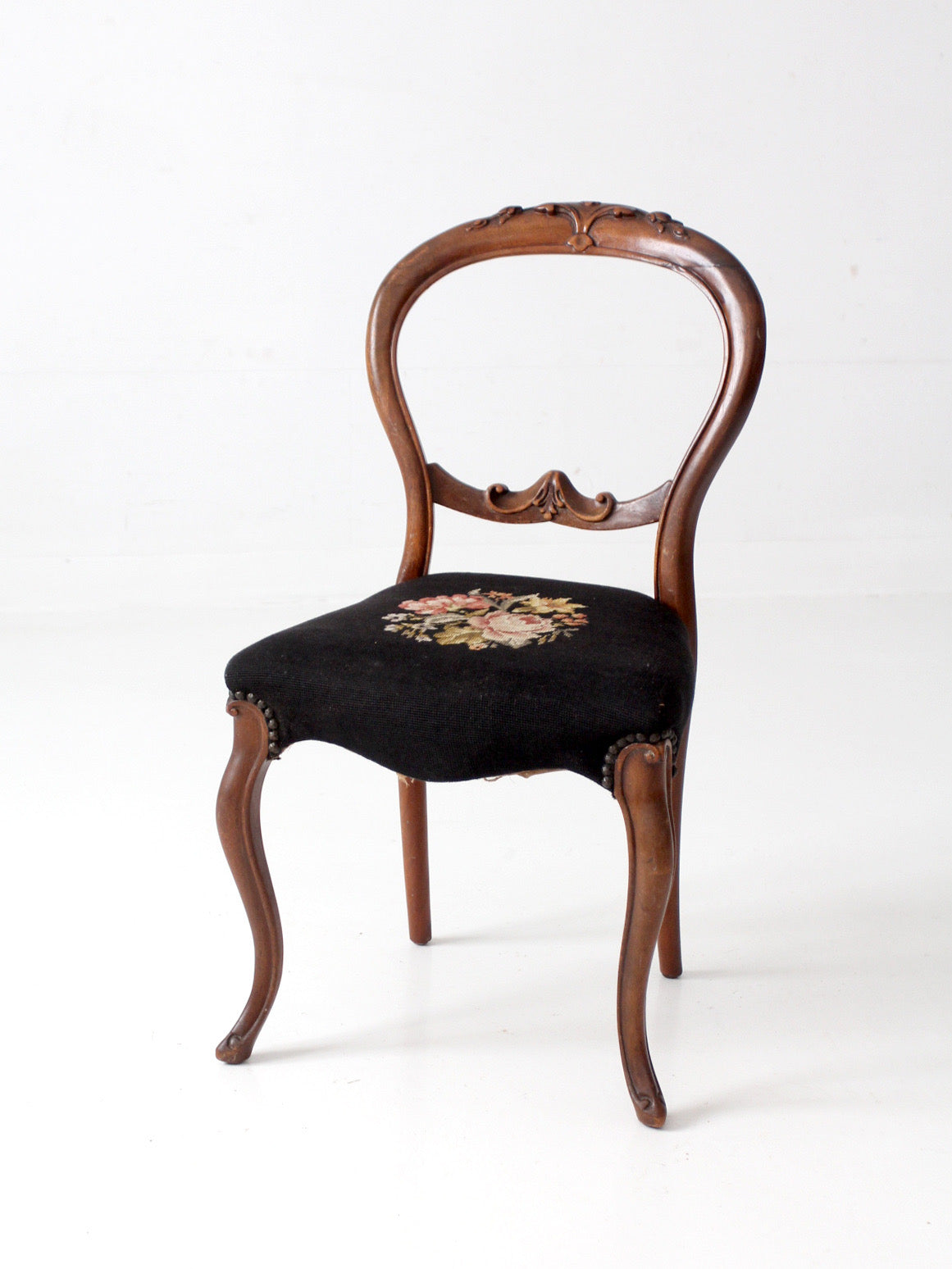 antique Victorian balloon-back chair with needlepoint upholstery