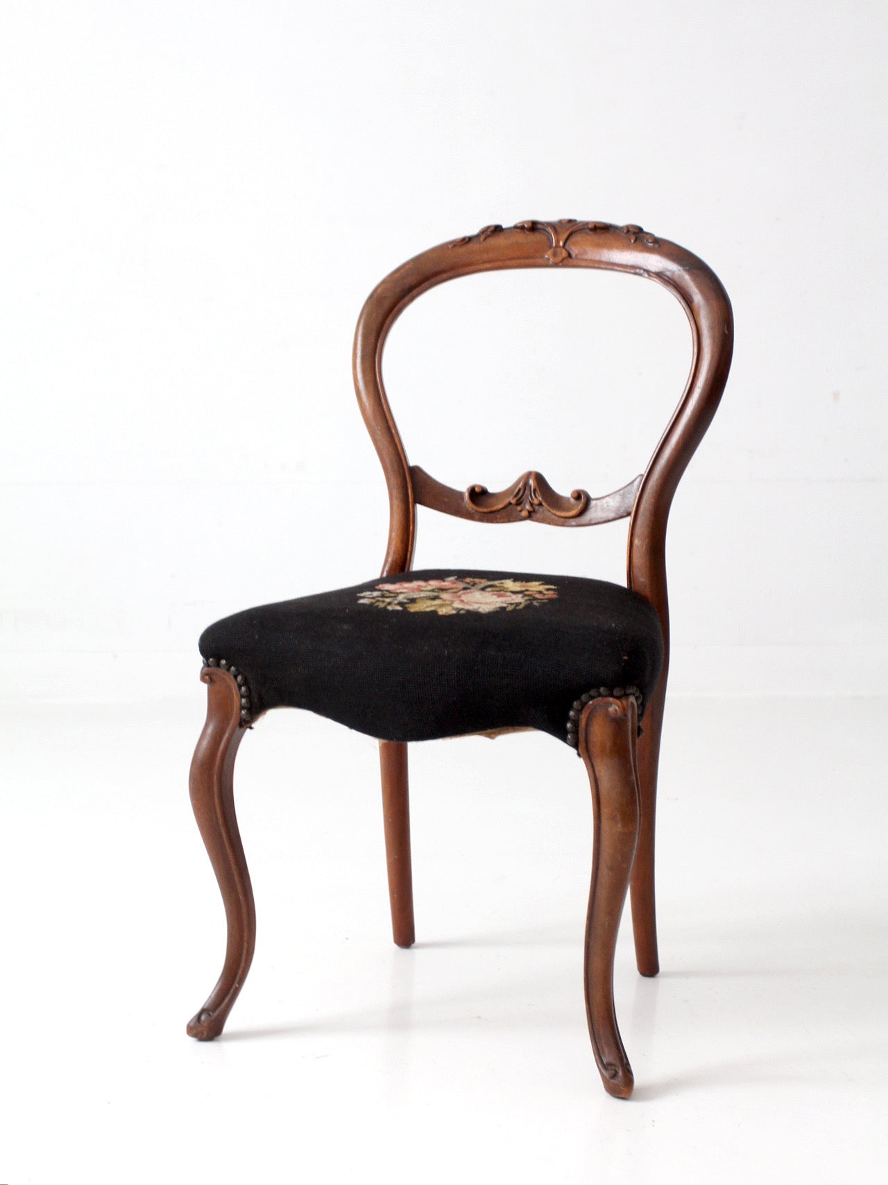 antique Victorian balloon-back chair with needlepoint upholstery