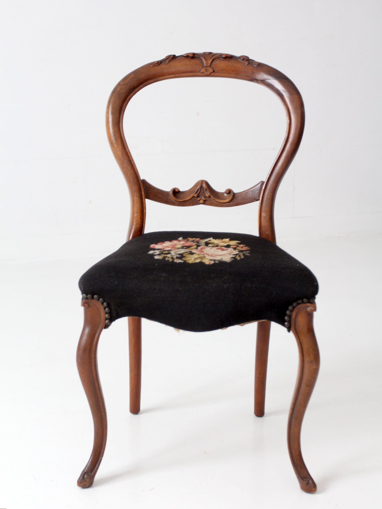 antique Victorian balloon-back chair with needlepoint upholstery