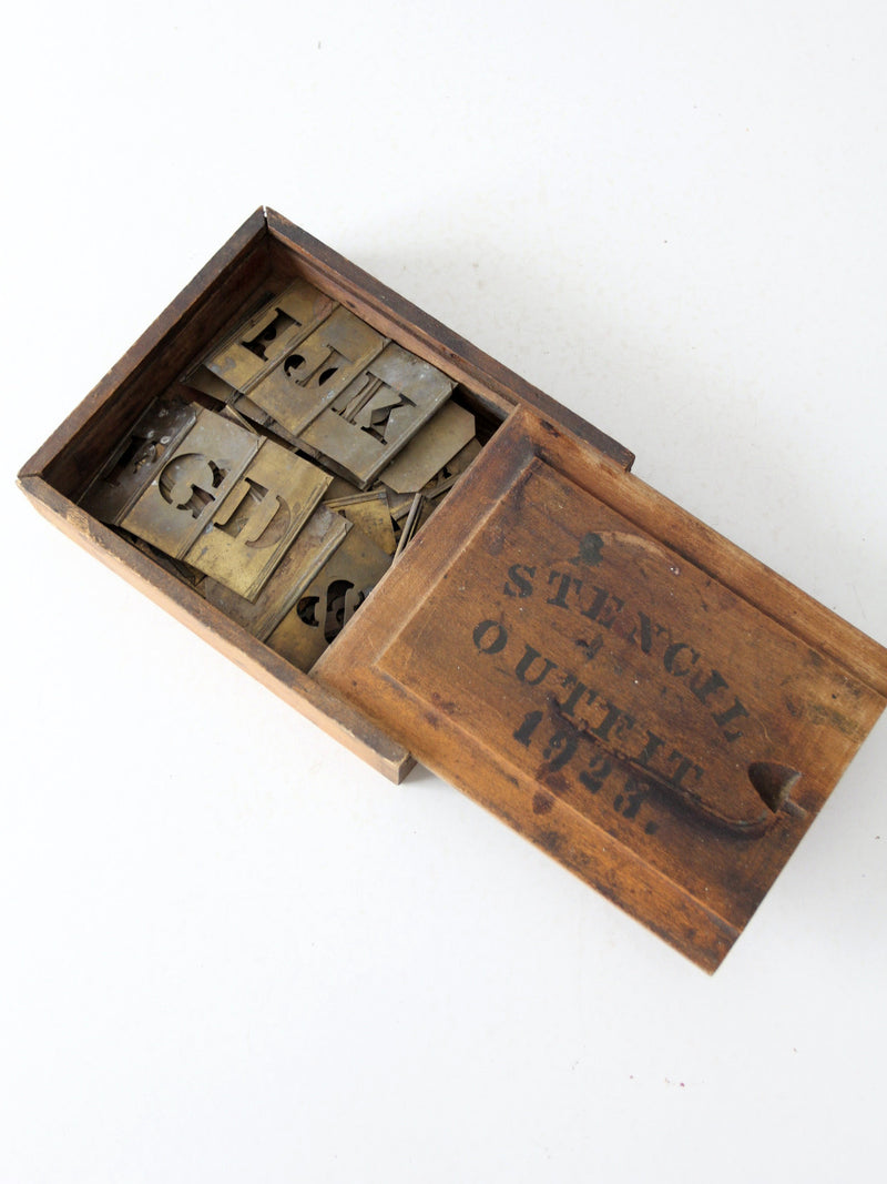 1920s brass stencil set with box