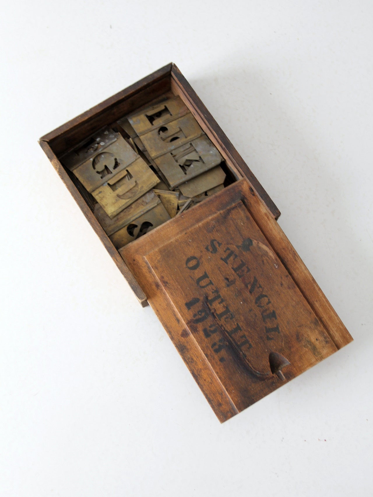 1920s brass stencil set with box
