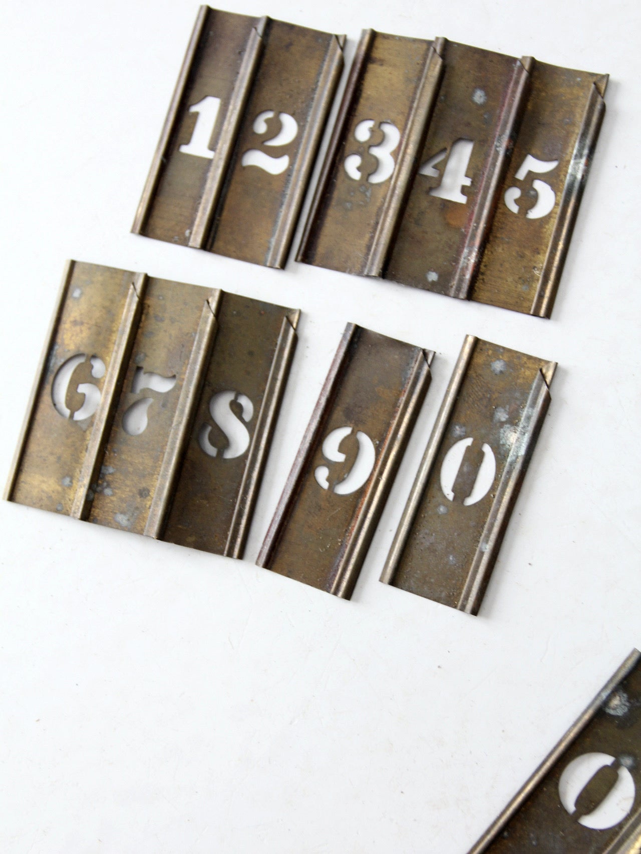 1920s brass stencil set with box