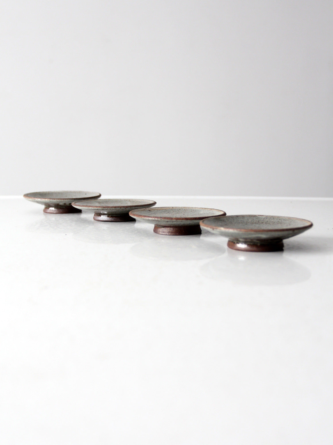 vintage small studio pottery plates set of 4