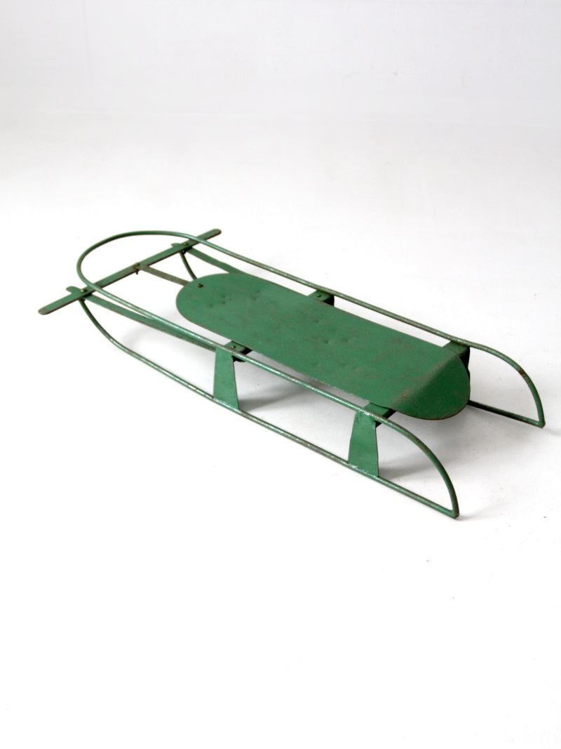 vintage green metal sled